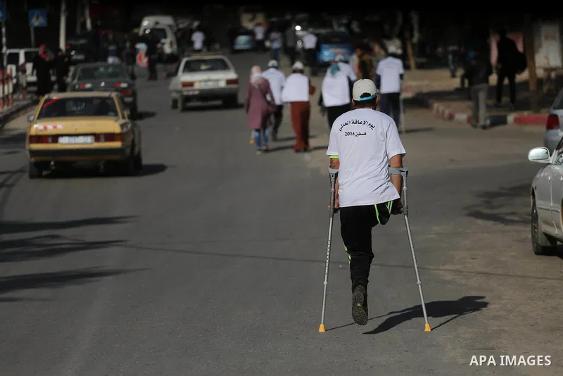 Palestinian disabilities to compete in a marathon marking the International Day of Persons with Disabilities in Gaza City on Dec. 05, 2016. Photo by Mohammed Asad