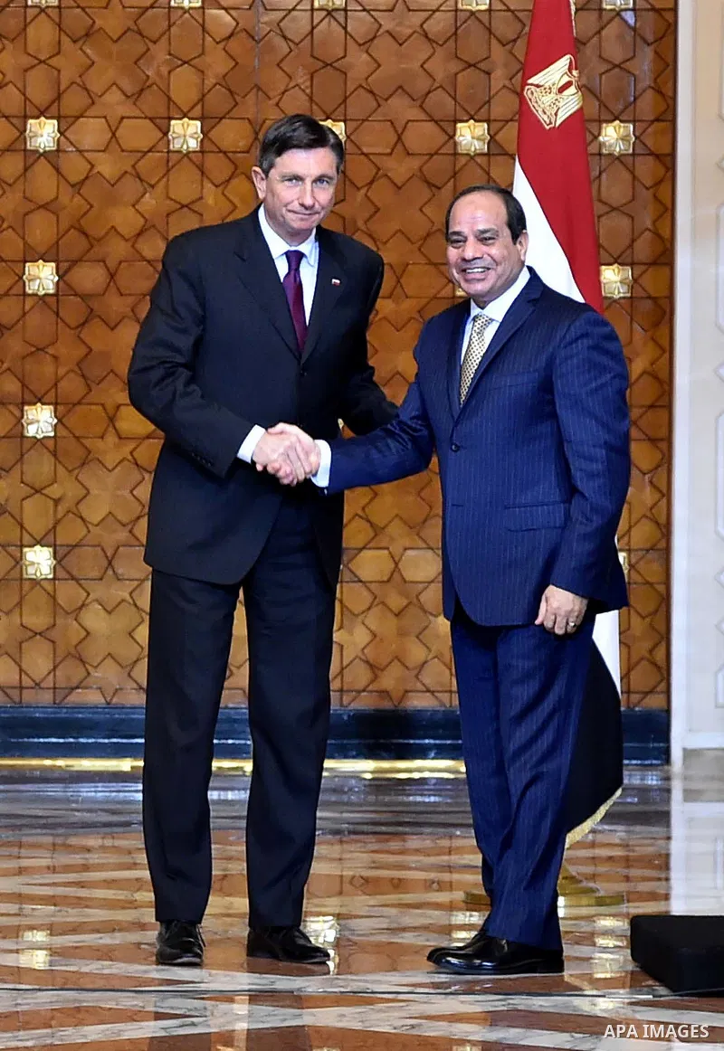 Egyptian President Abdel Fattah al-Sisi shake hands with Slovenian President Borut Pahor, before a meeting in Cairo, Egypt, on December 05, 2016. Photo by Egyptian President Office