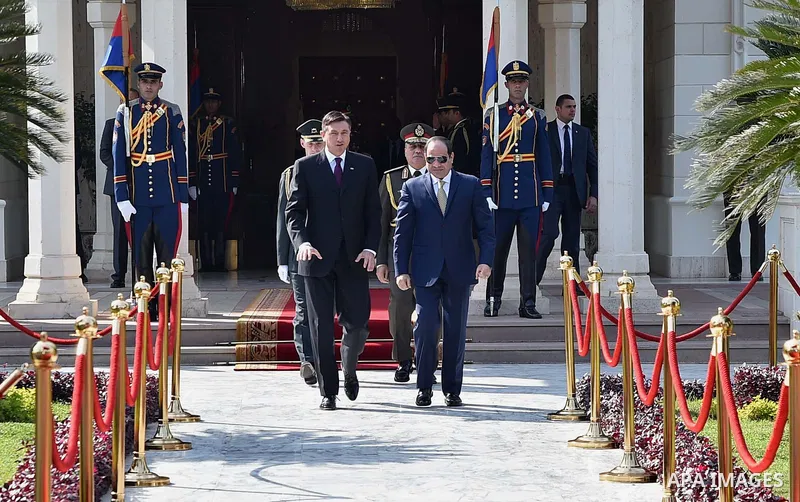 Egyptian President Abdel Fattah al-Sisi welcomes Slovenian President Borut Pahor upon his arrival at Cairo's international airport in Cairo, Egypt, on December 05, 2016. Photo by Egyptian President Office