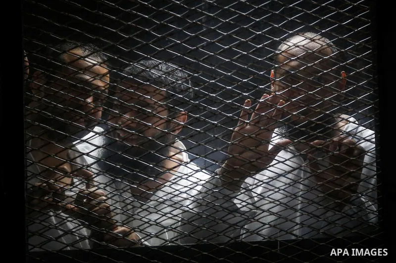 Suspects of Ansar Bait Al-Maqdis group, attend their trial in Cairo on December 6, 2016, on charges of assassination of police officers, attempted assassination of interior minister Mohamed Ibrahim and explosions near se...