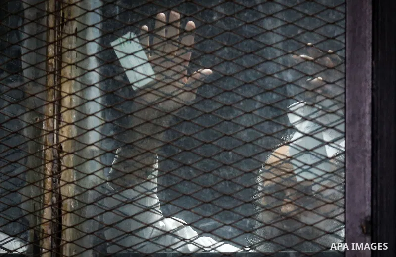 Suspects of Ansar Bait Al-Maqdis group, attend their trial in Cairo on December 6, 2016, on charges of assassination of police officers, attempted assassination of interior minister Mohamed Ibrahim and explosions near se...