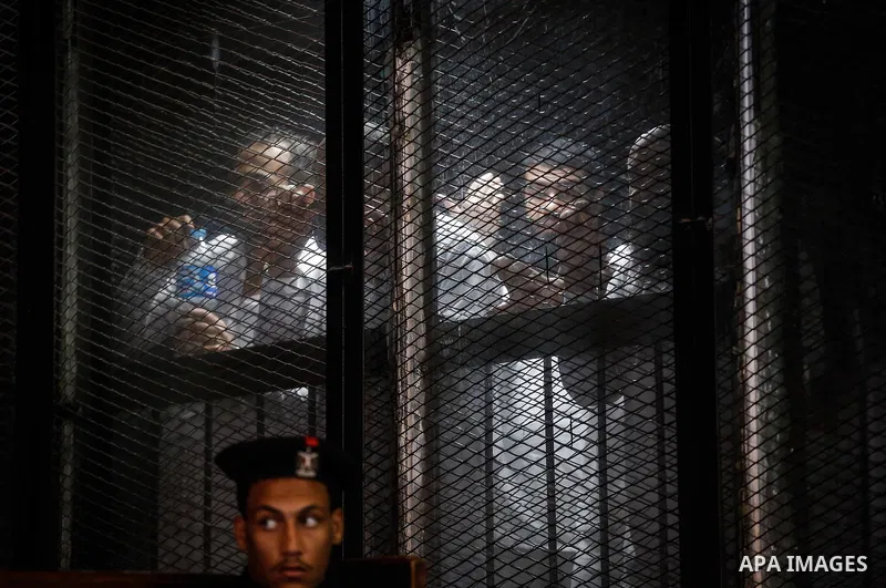 Suspects of Ansar Bait Al-Maqdis group, attend their trial in Cairo on December 6, 2016, on charges of assassination of police officers, attempted assassination of interior minister Mohamed Ibrahim and explosions near se...