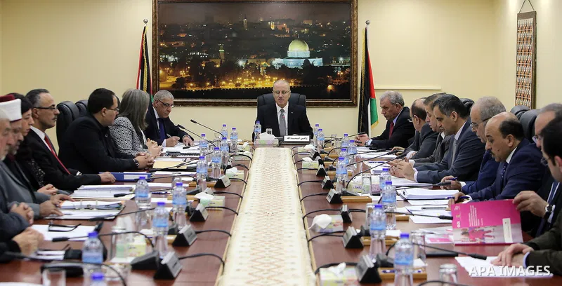 Palestinian Prime Minister, Rami Hamdallah, chairs a meeting of the council Ministers, in the West Bank city of Ramallah, on December 6, 2016. Photo by Prime Minister Office