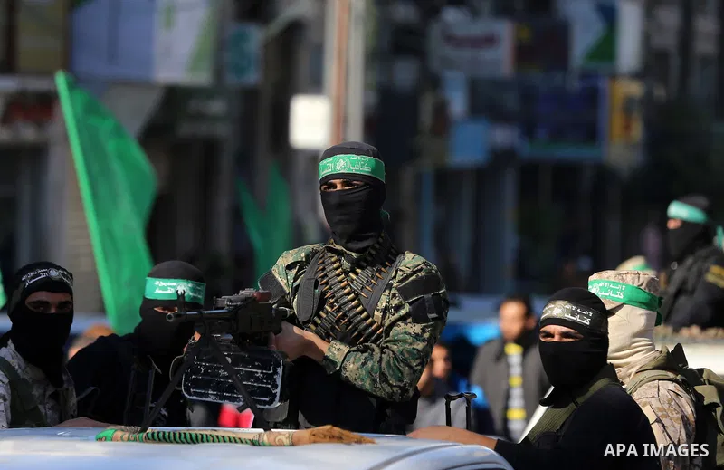 Palestinian Hamas militants attend the funeral of fellow of their comrade who was killed when a tunnel collapsed on Wednesday, during his funeral in Gaza City December 8, 2016. Photo by Yasser Qudih