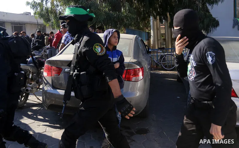 Palestinian Hamas militants attend the funeral of fellow of their comrade who was killed when a tunnel collapsed on Wednesday, during his funeral in Gaza City December 8, 2016. Photo by Yasser Qudih