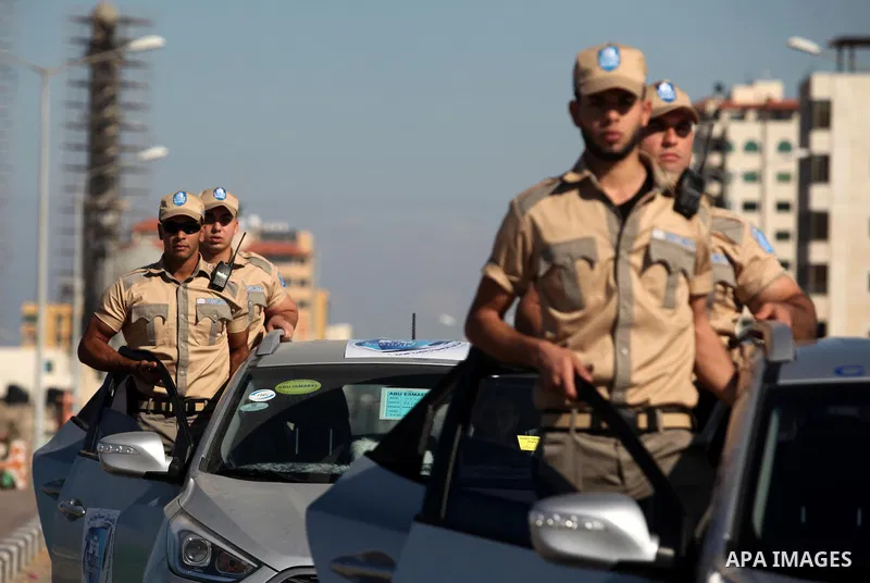 Palestinian private security guards from Castle Security company take part in an exercise during a simulation on how to secure important characters, in Gaza City on December 08, 2016. Photo by Ashraf Amra