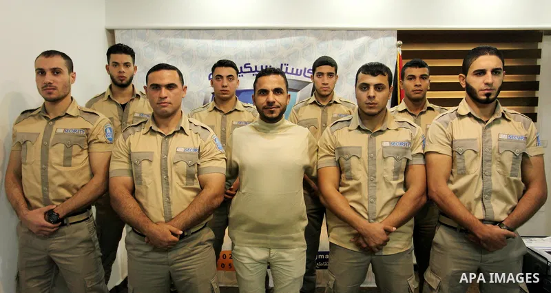 Palestinian private security guards from Castle Security company take part in a work day in Gaza City on December 08, 2016. Photo by Ashraf Amra