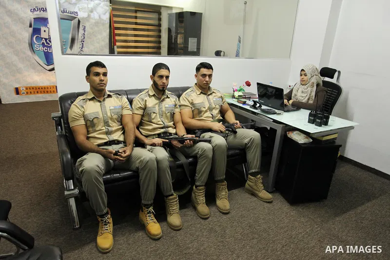 Palestinian private security guards from Castle Security company take part in a work day in Gaza City on December 08, 2016. Photo by Ashraf Amra