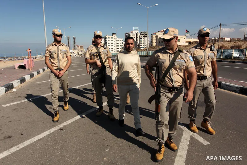 Palestinian private security guards from Castle Security company take part in an exercise during a simulation on how to secure important characters, in Gaza City on December 08, 2016. Photo by Ashraf Amra