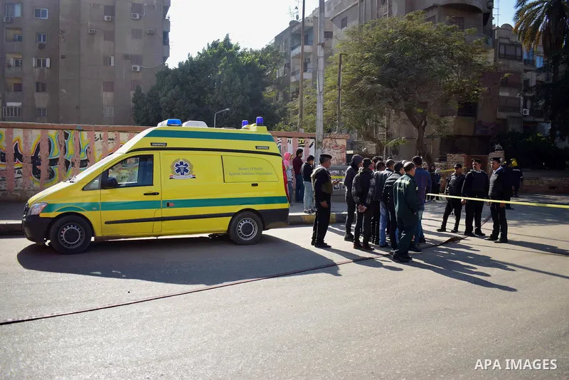 Egyptian security officials and investigators inspect the scene of a bomb blast in Giza Al Haram Street on the outskirts of Cairo, Egypt December 9, 2016. Photo by Amr Sayed