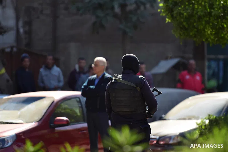 Egyptian special police officers stand guard at the scene of a bomb blast in Giza Al Haram Street on the outskirts of Cairo, Egypt December 9, 2016. Photo by Amr Sayed