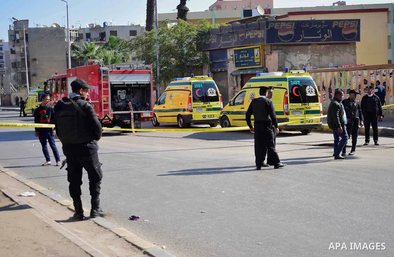 Egyptian special police officers stand guard at the scene of a bomb blast in Giza Al Haram Street on the outskirts of Cairo, Egypt December 9, 2016. Photo by Amr Sayed