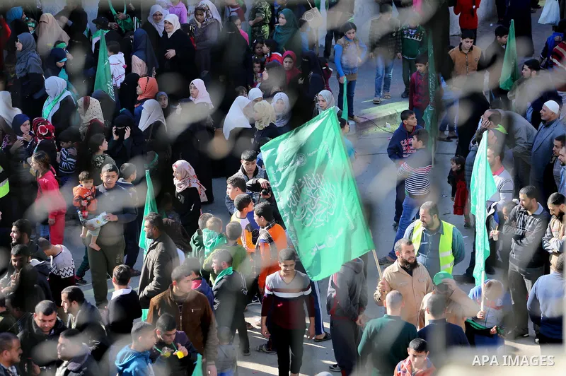 Palestinian Hamas supporters take part in a rally marking the 29th anniversary of Hamas foundation, in Jabalia in the northern of Gaza Strip, on December 09, 2016. Photo by Mohammed Asad