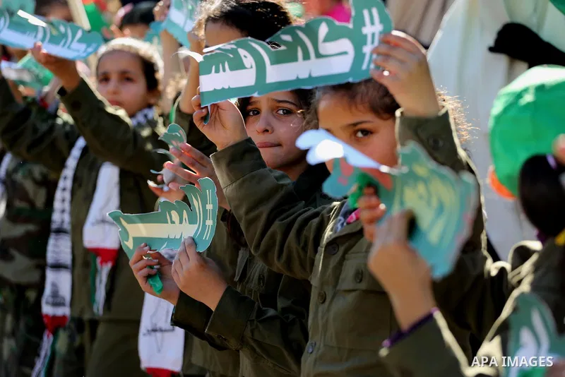 Palestinian Hamas supporters take part in a rally marking the 29th anniversary of Hamas foundation, in Jabalia in the northern of Gaza Strip, on December 09, 2016. Photo by Mohammed Asad
