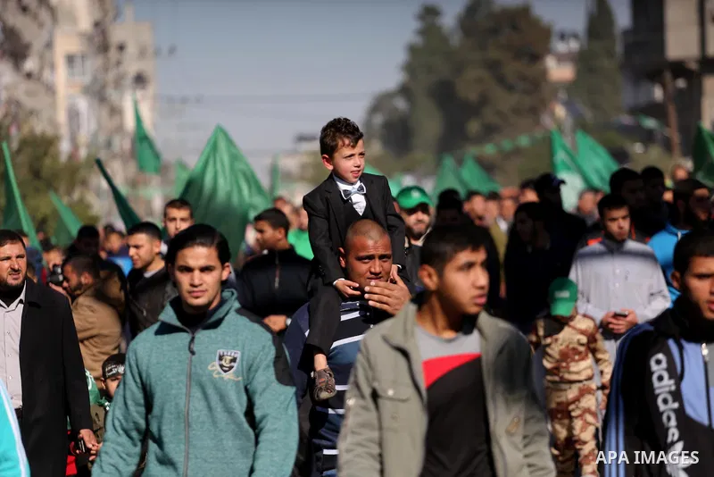 Palestinian Hamas supporters take part in a rally marking the 29th anniversary of Hamas foundation, in Jabalia in the northern of Gaza Strip, on December 09, 2016. Photo by Mohammed Asad