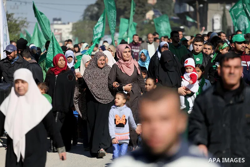 Palestinian Hamas supporters take part in a rally marking the 29th anniversary of Hamas foundation, in Jabalia in the northern of Gaza Strip, on December 09, 2016. Photo by Mohammed Asad
