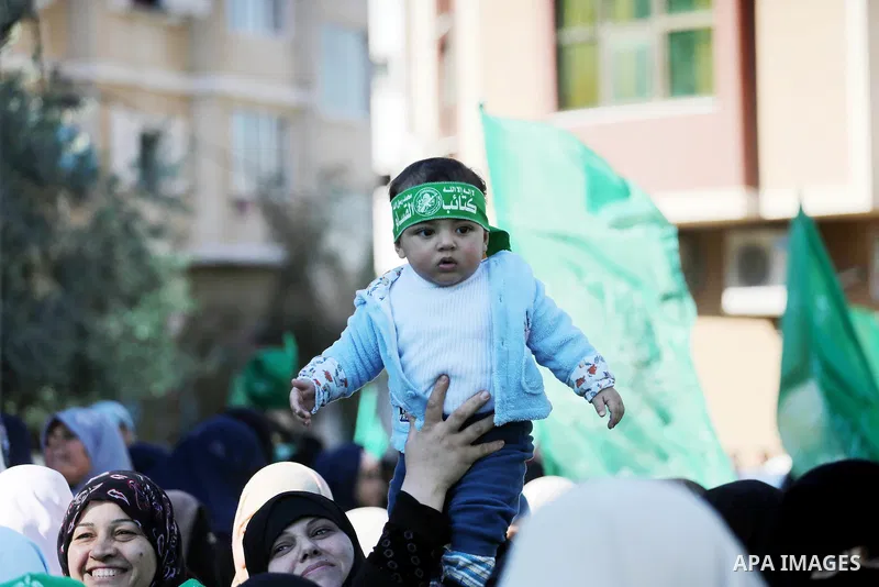 Palestinian Hamas supporters take part in a rally marking the 29th anniversary of Hamas foundation, in Jabalia in the northern of Gaza Strip, on December 09, 2016. Photo by Mohammed Asad