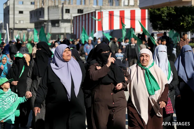 Palestinian Hamas supporters take part in a rally marking the 29th anniversary of Hamas foundation, in Jabalia in the northern of Gaza Strip, on December 09, 2016. Photo by Mohammed Asad