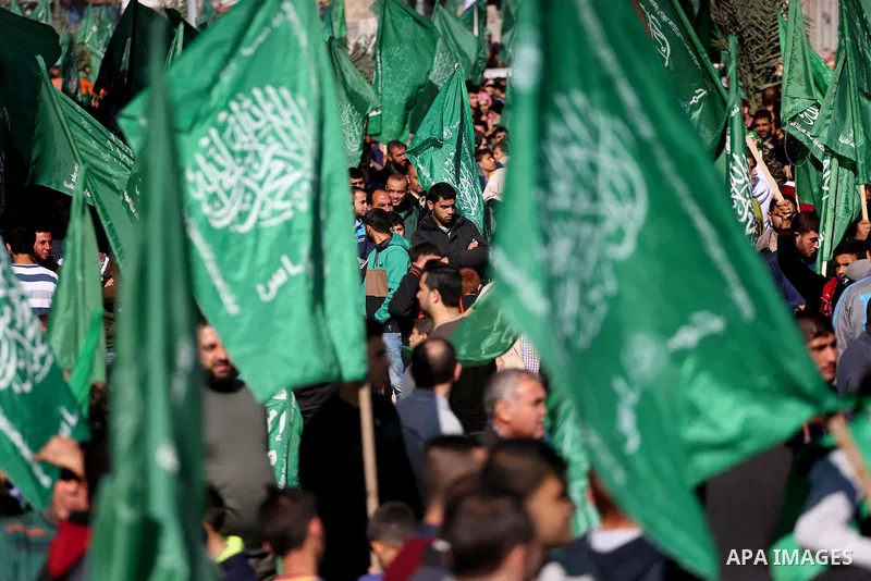 Palestinian Hamas supporters take part in a rally marking the 29th anniversary of Hamas foundation, in Jabalia in the northern of Gaza Strip, on December 09, 2016. Photo by Mohammed Asad