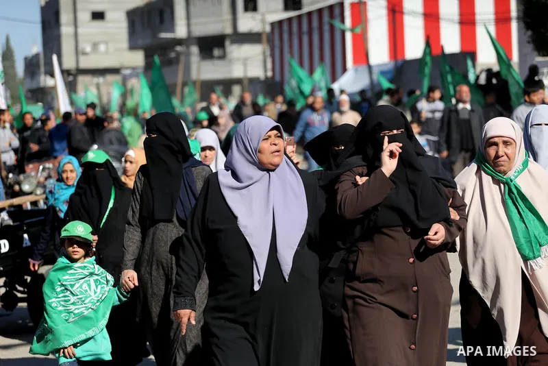 Palestinian Hamas supporters take part in a rally marking the 29th anniversary of Hamas foundation, in Jabalia in the northern of Gaza Strip, on December 09, 2016. Photo by Mohammed Asad