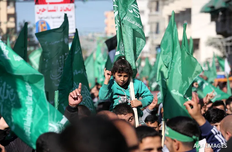Palestinian Hamas supporters take part in a rally marking the 29th anniversary of Hamas foundation, in Jabalia in the northern of Gaza Strip, on December 09, 2016. Photo by Mohammed Asad