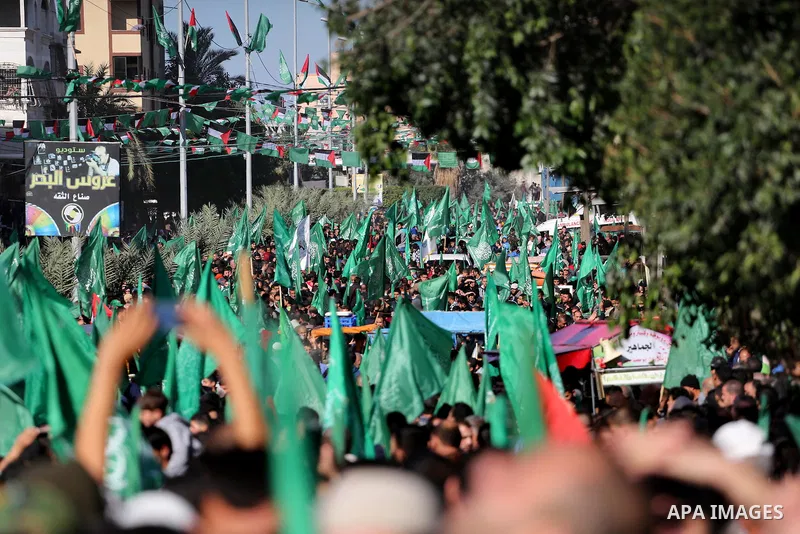 Palestinian Hamas supporters take part in a rally marking the 29th anniversary of Hamas foundation, in Jabalia in the northern of Gaza Strip, on December 09, 2016. Photo by Mohammed Asad