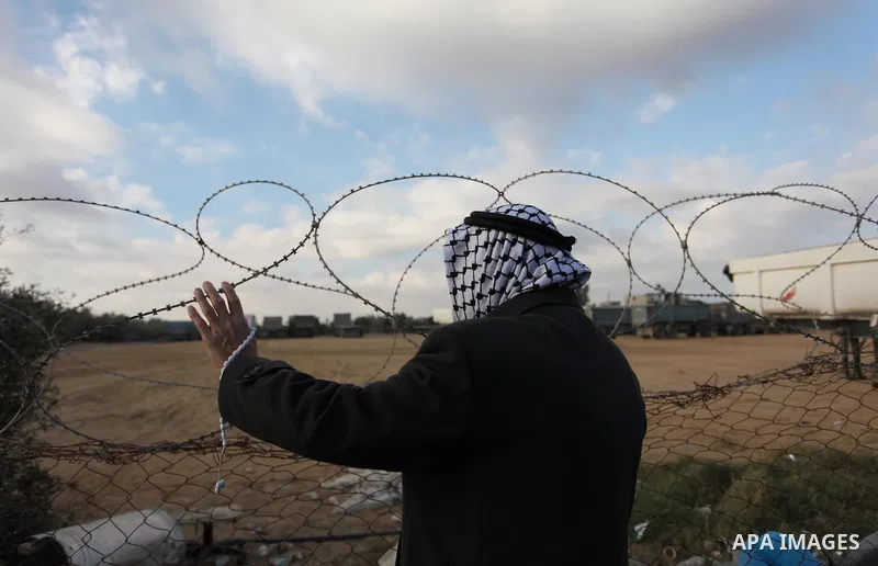 Palestinians wait for travel permits to cross into Egypt through the Rafah border crossing after it was opened by Egyptian authorities for humanitarian cases, in Rafah in the southern Gaza Strip December 10, 2016. An off...