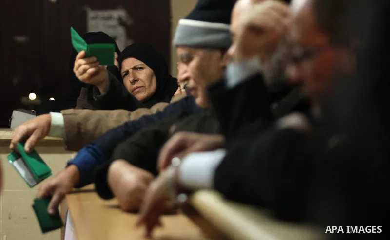 Palestinians wait for travel permits to cross into Egypt through the Rafah border crossing after it was opened by Egyptian authorities for humanitarian cases, in Rafah in the southern Gaza Strip December 10, 2016. An off...