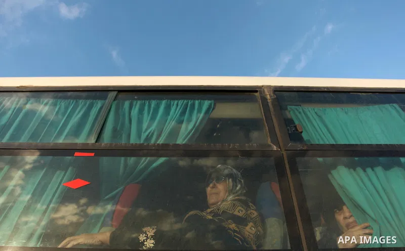 Palestinians wait for travel permits to cross into Egypt through the Rafah border crossing after it was opened by Egyptian authorities for humanitarian cases, in Rafah in the southern Gaza Strip December 10, 2016. An off...
