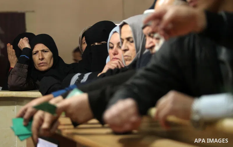 Palestinians wait for travel permits to cross into Egypt through the Rafah border crossing after it was opened by Egyptian authorities for humanitarian cases, in Rafah in the southern Gaza Strip December 10, 2016. An off...