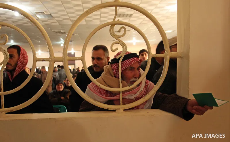 Palestinians wait for travel permits to cross into Egypt through the Rafah border crossing after it was opened by Egyptian authorities for humanitarian cases, in Rafah in the southern Gaza Strip December 10, 2016. An off...