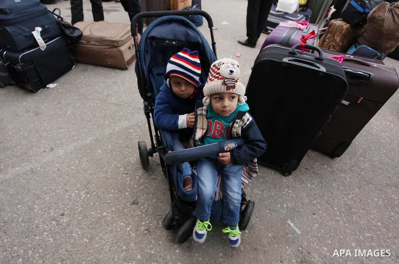 Palestinians wait for travel permits to cross into Egypt through the Rafah border crossing after it was opened by Egyptian authorities for humanitarian cases, in Rafah in the southern Gaza Strip December 10, 2016. An off...