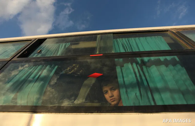 Palestinians wait for travel permits to cross into Egypt through the Rafah border crossing after it was opened by Egyptian authorities for humanitarian cases, in Rafah in the southern Gaza Strip December 10, 2016. An off...
