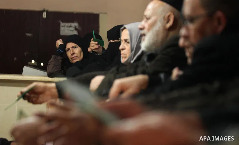 Palestinians wait for travel permits to cross into Egypt through the Rafah border crossing after it was opened by Egyptian authorities for humanitarian cases, in Rafah in the southern Gaza Strip December 10, 2016. An off...