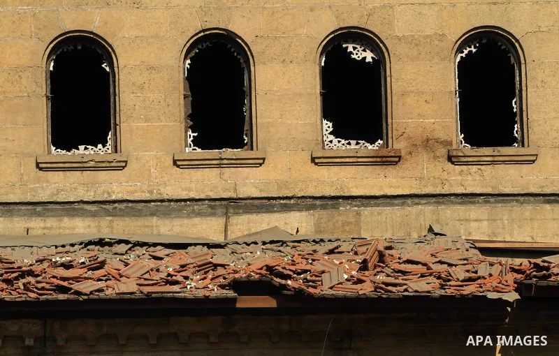 A picture shows the damaged Saint Peter and Saint Paul Coptic Orthodox Church after a bombing on December 11, 2016, in Cairo's Abbasiya neighbourhood. The blast killed at least 25 worshippers during Sunday mass inside th...