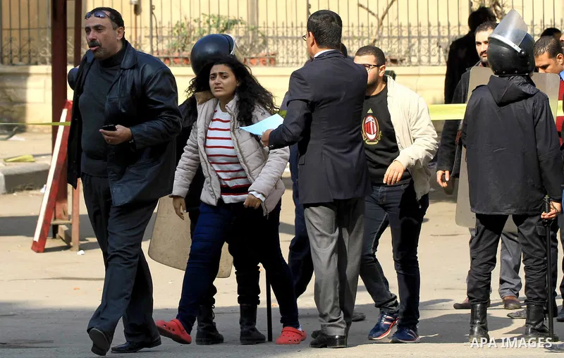 A relative of one of the blast victims reacts at the scene of a bomb explosion at the Saint Peter and Saint Paul Coptic Orthodox Church on December 11, 2016, in Cairo's Abbasiya neighbourhood. The blast killed at least 2...