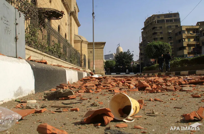 A picture shows the damaged Saint Peter and Saint Paul Coptic Orthodox Church after a bombing on December 11, 2016, in Cairo's Abbasiya neighbourhood. The blast killed at least 25 worshippers during Sunday mass inside th...