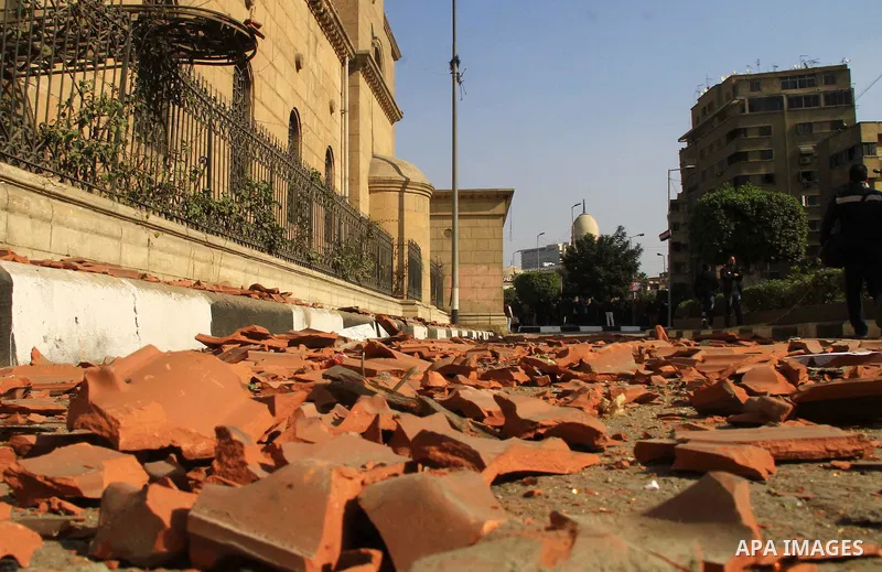 A picture shows the damaged Saint Peter and Saint Paul Coptic Orthodox Church after a bombing on December 11, 2016, in Cairo's Abbasiya neighbourhood. The blast killed at least 25 worshippers during Sunday mass inside th...