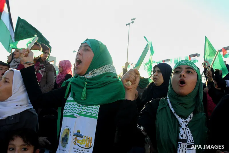 Palestinians take part in a rally marking the 29th anniversary of the founding of the Hamas movement, in Khan Younis in the southern Gaza Strip December 11, 2016. Photo by Abed Rahim Khatib