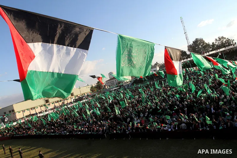 Palestinians take part in a rally marking the 29th anniversary of the founding of the Hamas movement, in Khan Younis in the southern Gaza Strip December 11, 2016. Photo by Abed Rahim Khatib