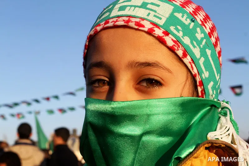 Palestinians take part in a rally marking the 29th anniversary of the founding of the Hamas movement, in Khan Younis in the southern Gaza Strip December 11, 2016. Photo by Abed Rahim Khatib