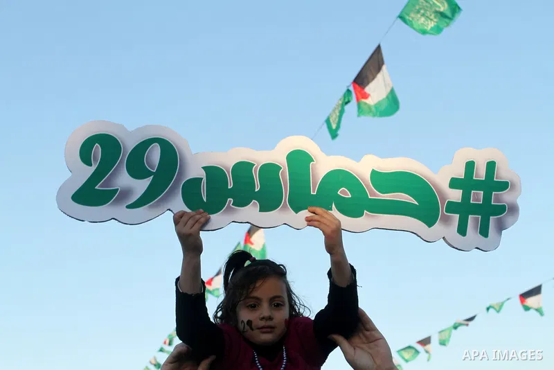 Palestinians take part in a rally marking the 29th anniversary of the founding of the Hamas movement, in Khan Younis in the southern Gaza Strip December 11, 2016. Photo by Abed Rahim Khatib