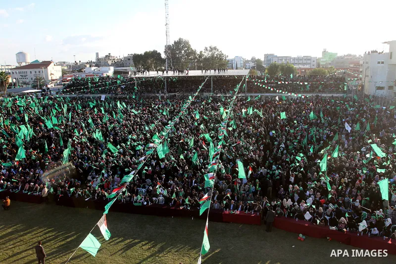 Palestinians take part in a rally marking the 29th anniversary of the founding of the Hamas movement, in Khan Younis in the southern Gaza Strip December 11, 2016. Photo by Abed Rahim Khatib