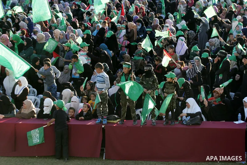 Palestinians take part in a rally marking the 29th anniversary of the founding of the Hamas movement, in Khan Younis in the southern Gaza Strip December 11, 2016. Photo by Abed Rahim Khatib