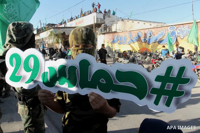 Palestinians take part in a rally marking the 29th anniversary of the founding of the Hamas movement, in Khan Younis in the southern Gaza Strip December 11, 2016. Photo by Abed Rahim Khatib
