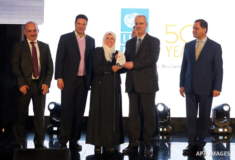 Palestinian Prime Minister Rami Hamdallah, attends the opening ceremony of the Palestine exporter Award 2016, in the Wes bank city of Ramallah, on December 12, 2016. Photo by Prime Minister Office