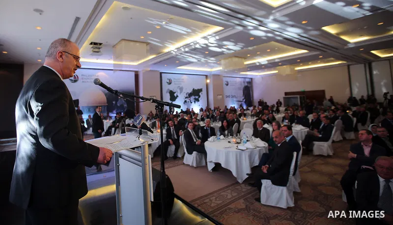 Palestinian Prime Minister Rami Hamdallah, attends the opening ceremony of the Palestine exporter Award 2016, in the Wes bank city of Ramallah, on December 12, 2016. Photo by Prime Minister Office