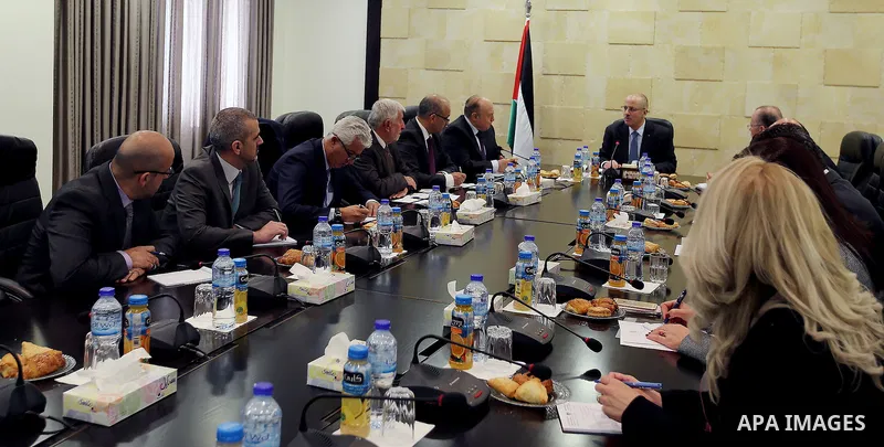 Palestinian Prime Minister Rami Hamdallah, chairs the first meeting of the national team for economic development, in the Wes bank city of Ramallah, on December 12, 2016. Photo by Prime Minister Office