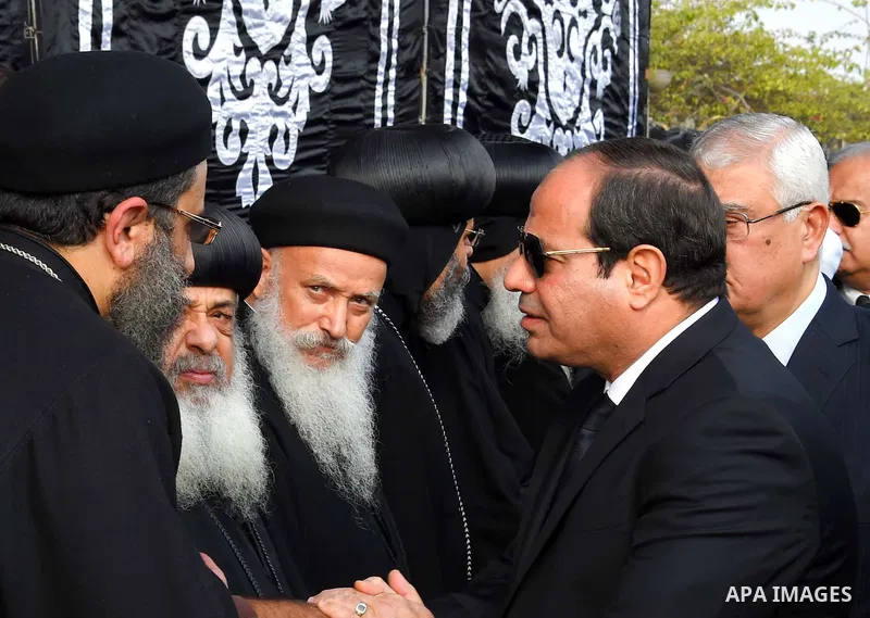 Egyptian President Abdel Fattah al-Sisi attends the funeral of the victims of a bomb explosion that targeted a Coptic Orthodox Church in Cairo, on December 12, 2016. Photo by Egyptian President Office