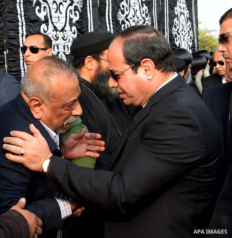 Egyptian President Abdel Fattah al-Sisi attends the funeral of the victims of a bomb explosion that targeted a Coptic Orthodox Church in Cairo, on December 12, 2016. Photo by Egyptian President Office